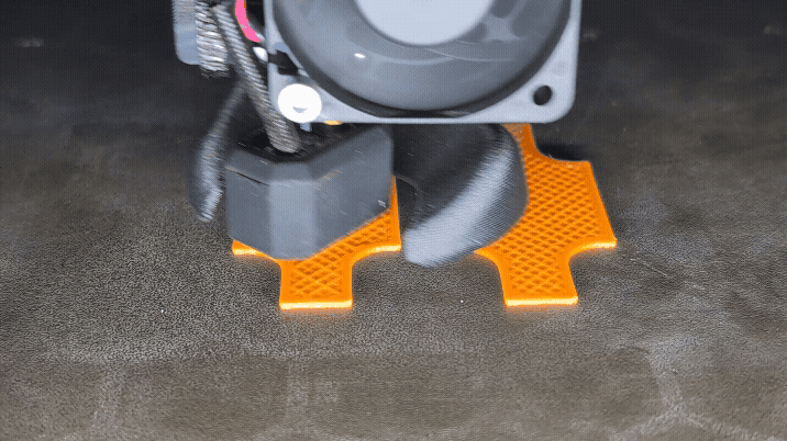 The Prusa Core One printing a part.